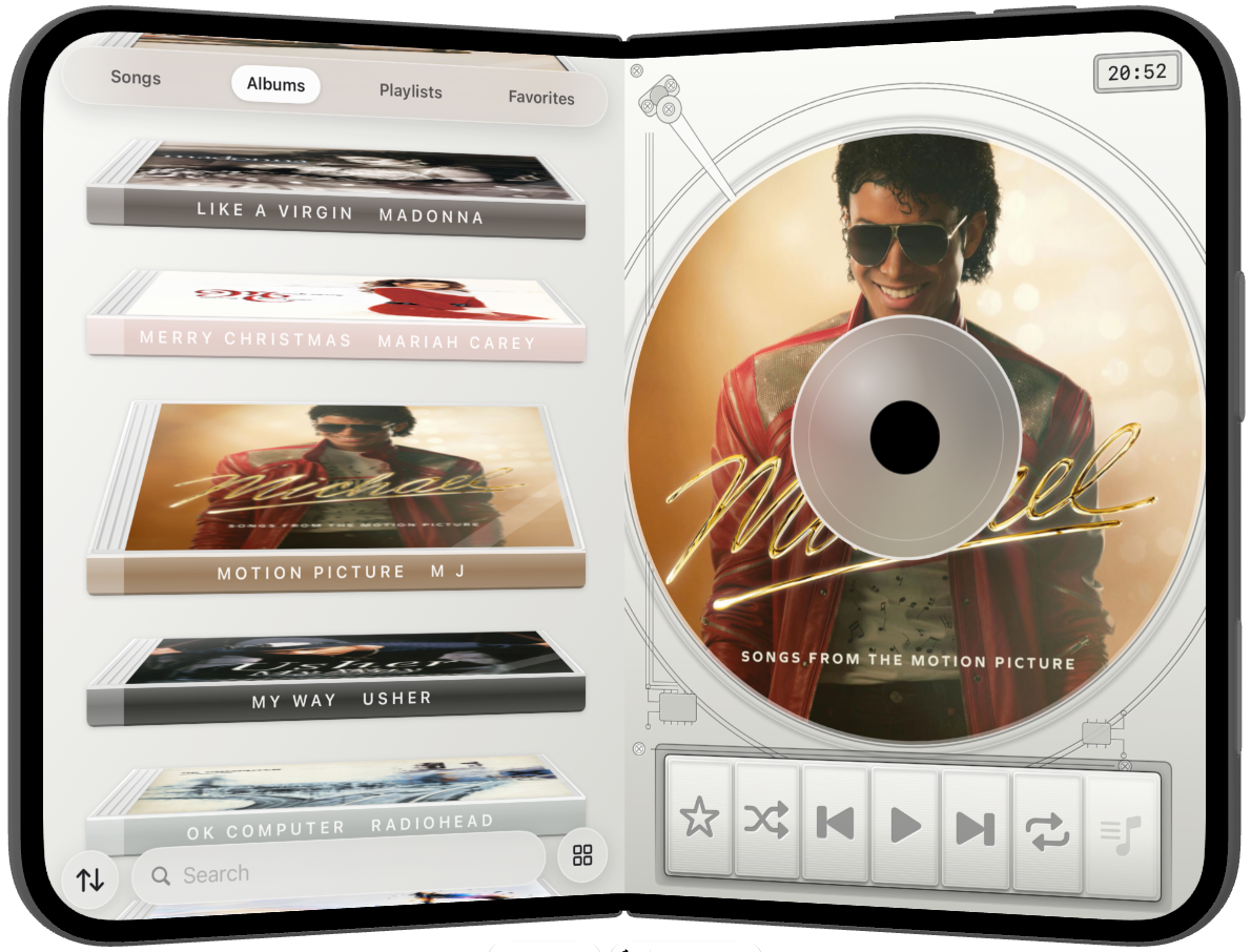 iPhone Duo partly open, albums beside the disc.