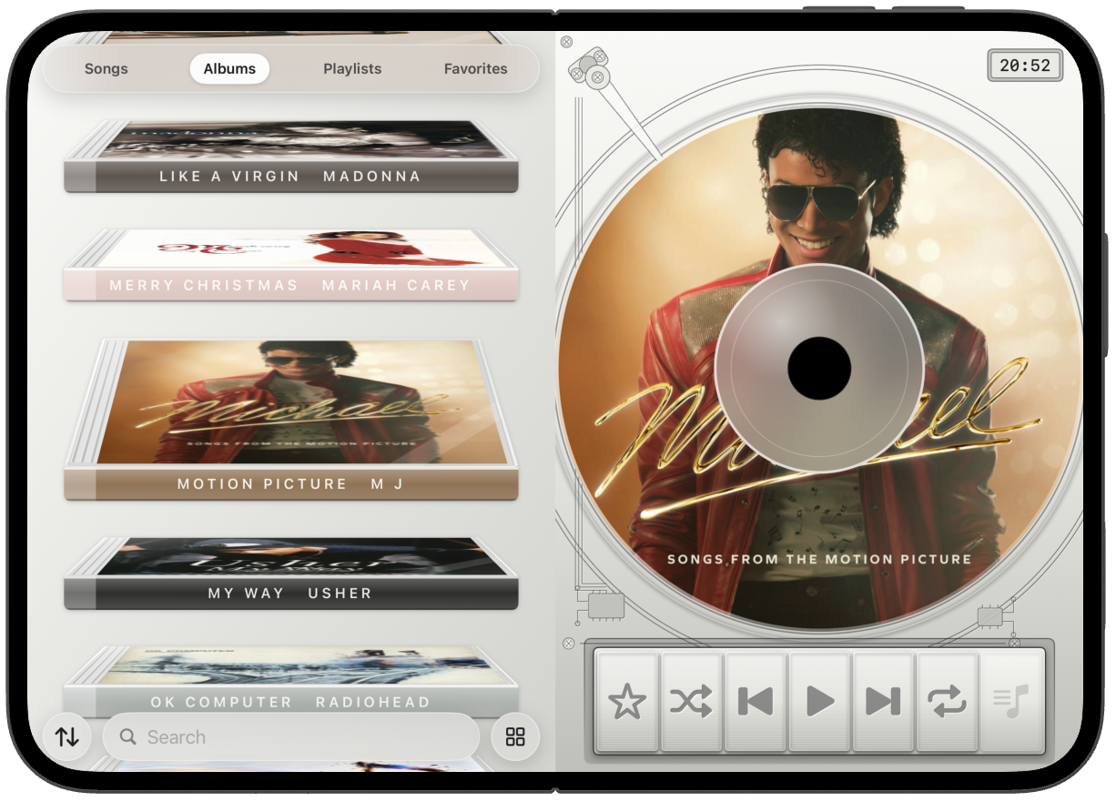 iPhone Duo open in Star White, albums beside the disc.